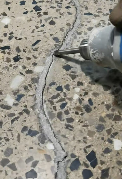 What should you do if your terrazzo cracks or changes color?