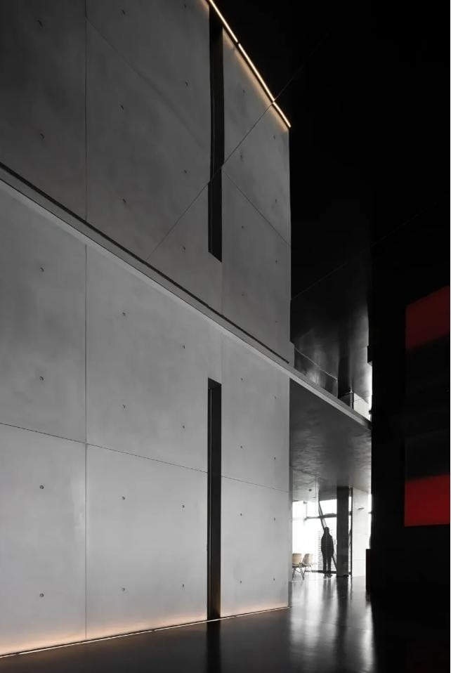 What are the main advantages of fair-faced concrete cement boards compared to other building materials?