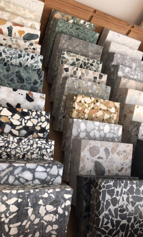 How is the wear resistance and durability of terrazzo under high traffic density or harsh environmental conditions?