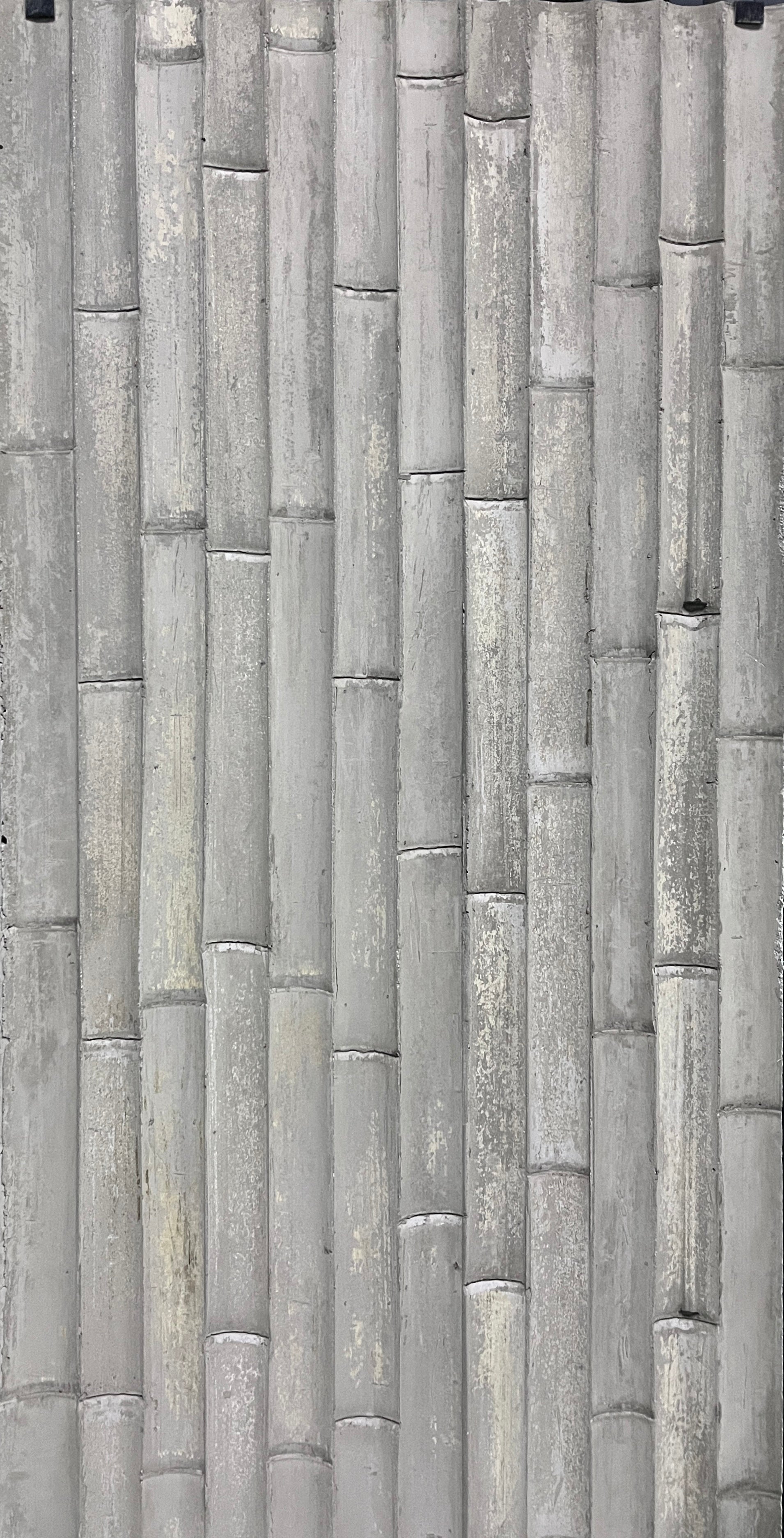 How is the “bamboo grain”effect achieved in bamboo grain cement board?