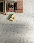 Sophisticated stone look terrazzo tiles for a timeless patio design