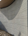 Custom woodgrain slotted fair-faced concrete decorative panels